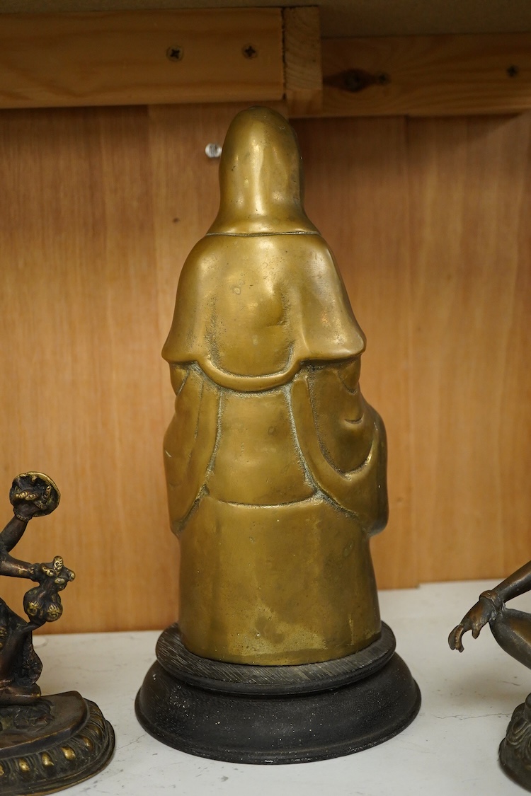 Three South East Asian brass figures to include one of Bodhisattva, largest 28cm high